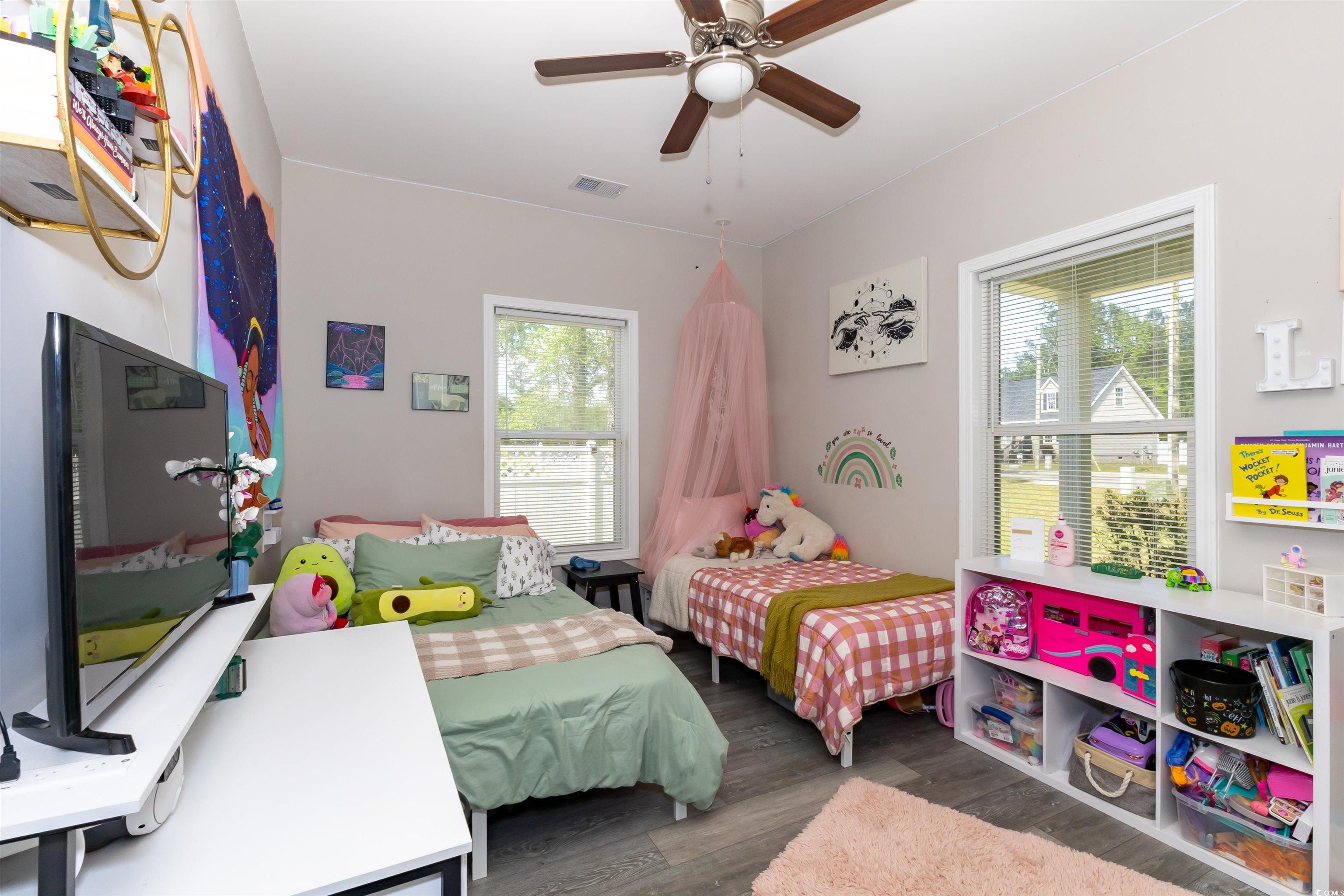 1501 Grainger Road Conway, SC 29527 - Photo 17 of 22 Bedroom featuring visible vents, a ceiling fan, an