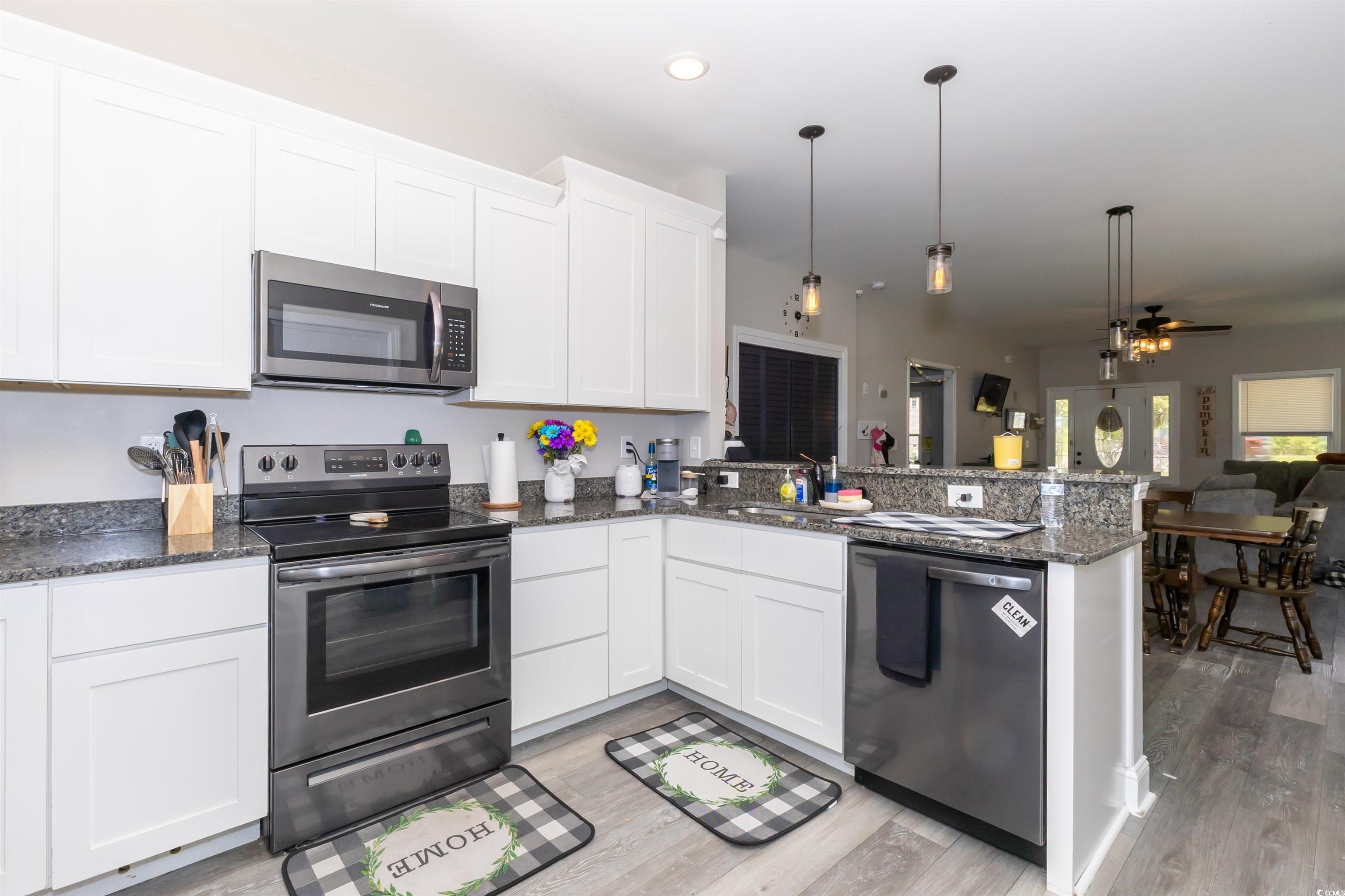 1501 Grainger Road Conway, SC 29527 - Photo 22 of 22 Kitchen with open floor plan, light wood-style flo