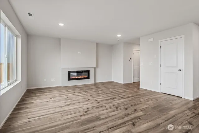 a view of kitchen with wooden floor