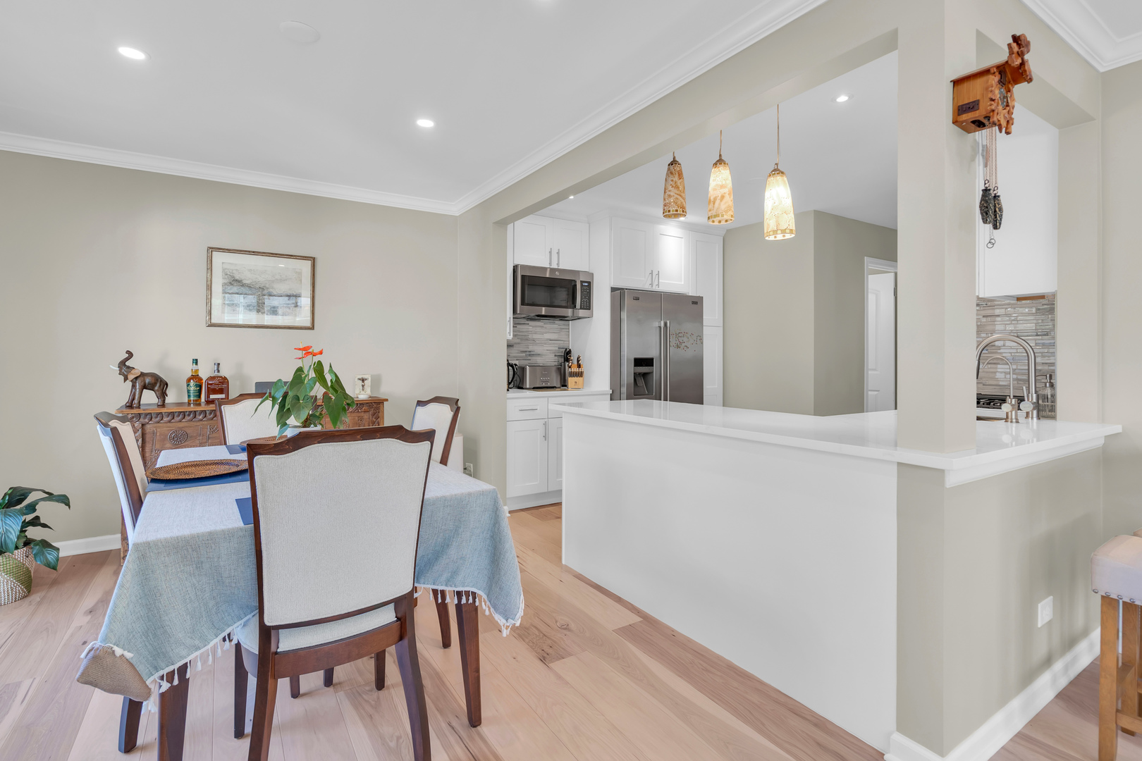 473 Le Parc Circle Buffalo Grove, IL 60089 - Photo 12 of 30 a view of a dining room with furniture and wooden floor