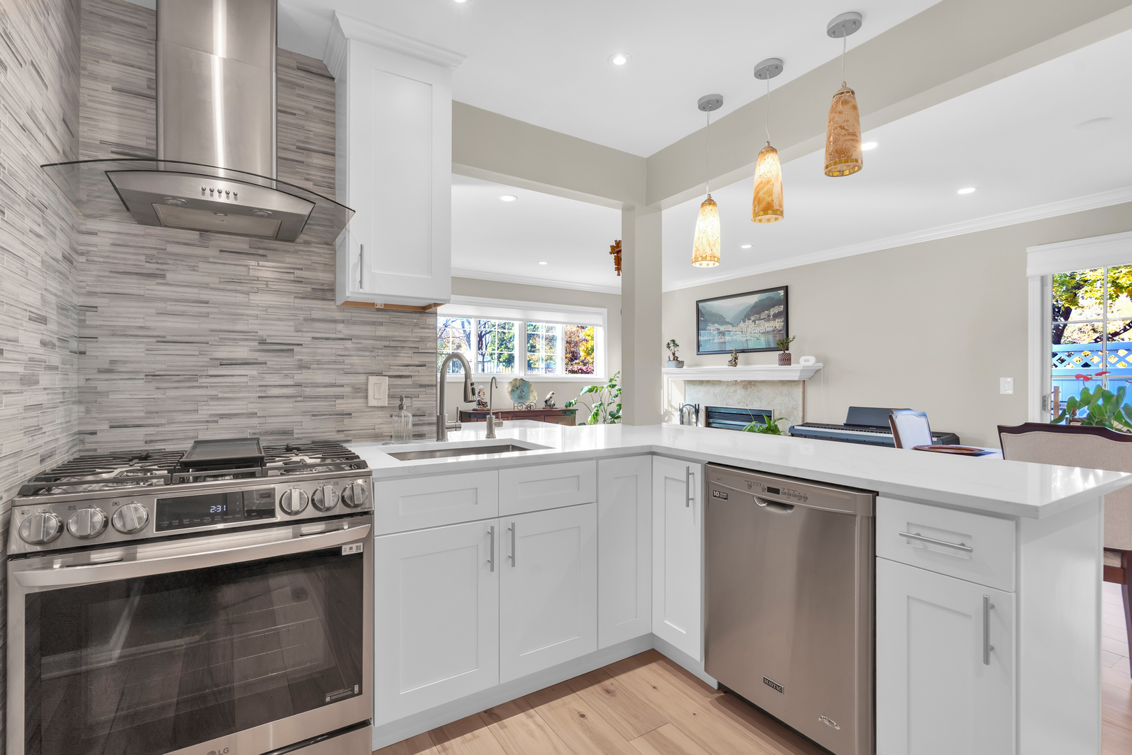 473 Le Parc Circle Buffalo Grove, IL 60089 - Photo 14 of 30 a kitchen with a sink stove and cabinets