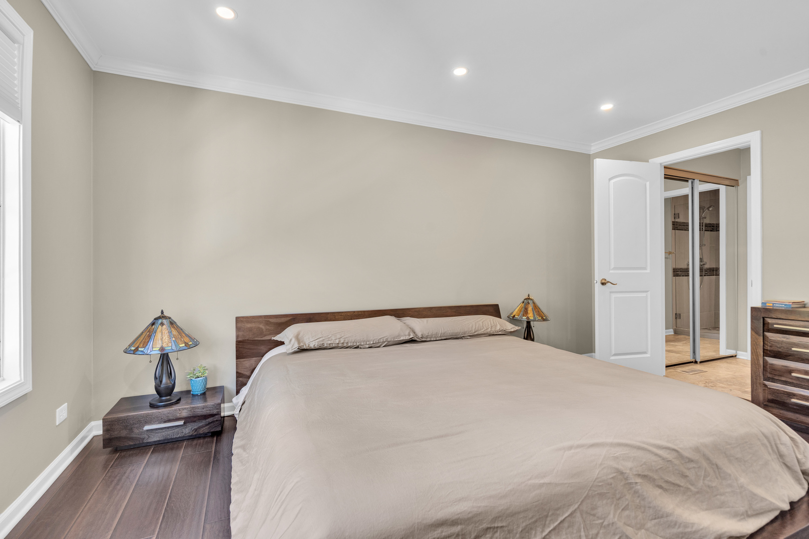 473 Le Parc Circle Buffalo Grove, IL 60089 - Photo 21 of 30 a bedroom with a bed and wooden floor