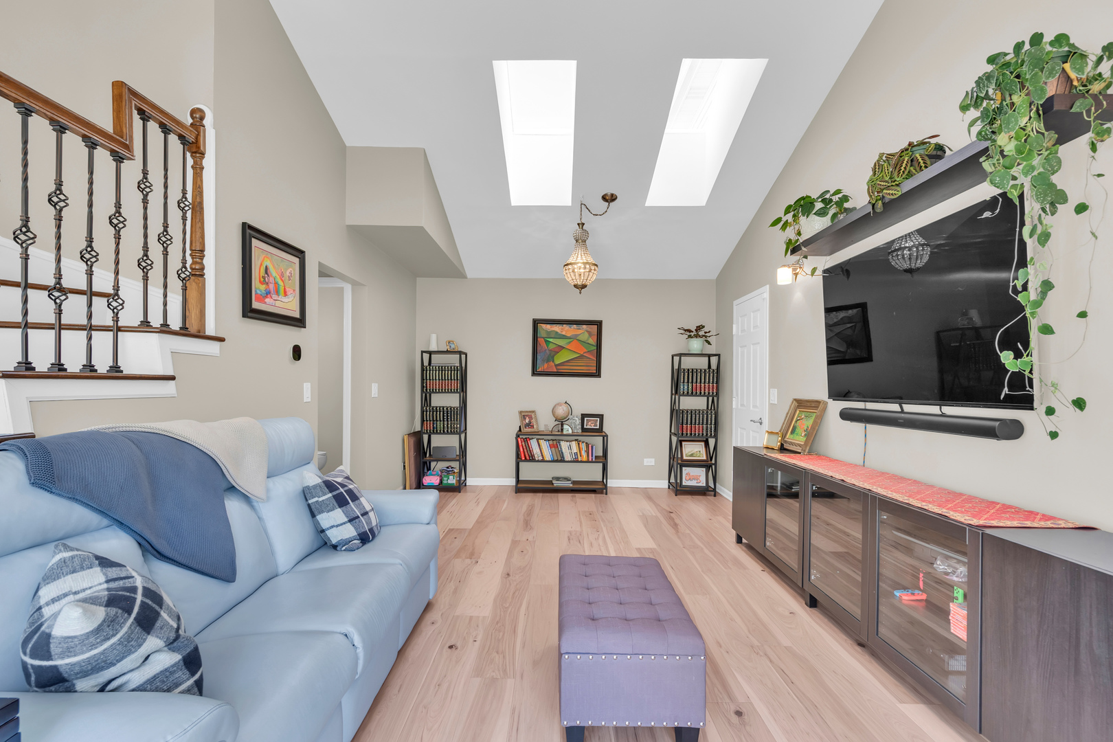 473 Le Parc Circle Buffalo Grove, IL 60089 - Photo 6 of 30 a living room with furniture and a flat screen tv