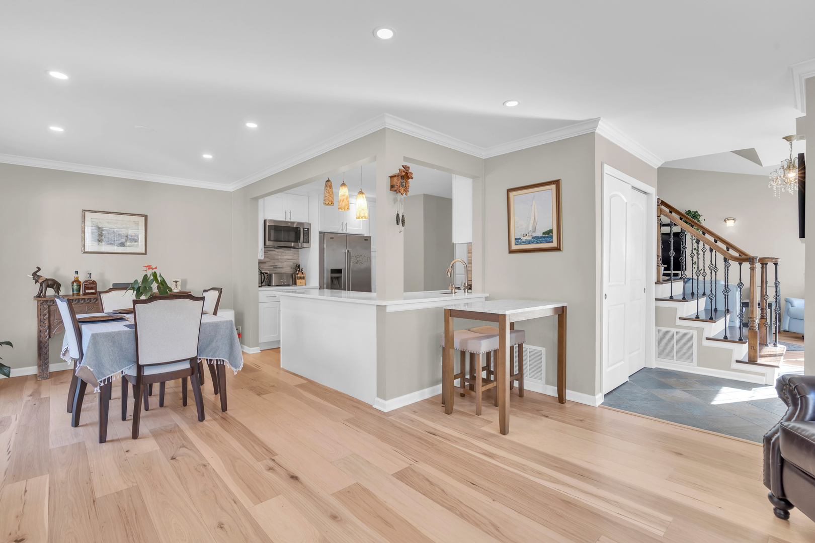473 Le Parc Circle Buffalo Grove, IL 60089 - Photo 10 of 30 a view of a dining room with furniture and wooden floor