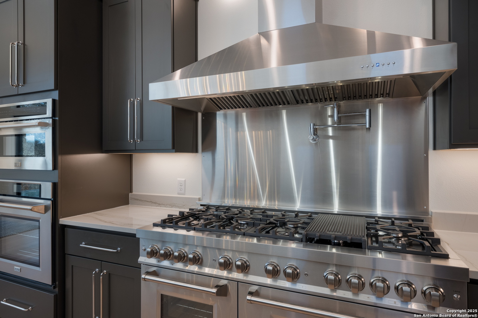 1341 Palmetto Spring Branch Spring Branch, TX 78070 - Photo 13 of 64 a kitchen with a stove and a refrigerator
