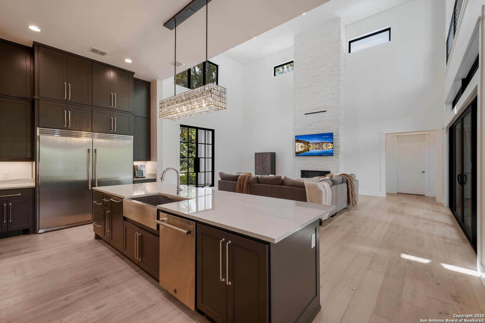 1341 Palmetto Spring Branch Spring Branch, TX 78070 - Photo 18 of 64 a kitchen with stainless steel appliances a sink a stove a refrigerator and cabinets