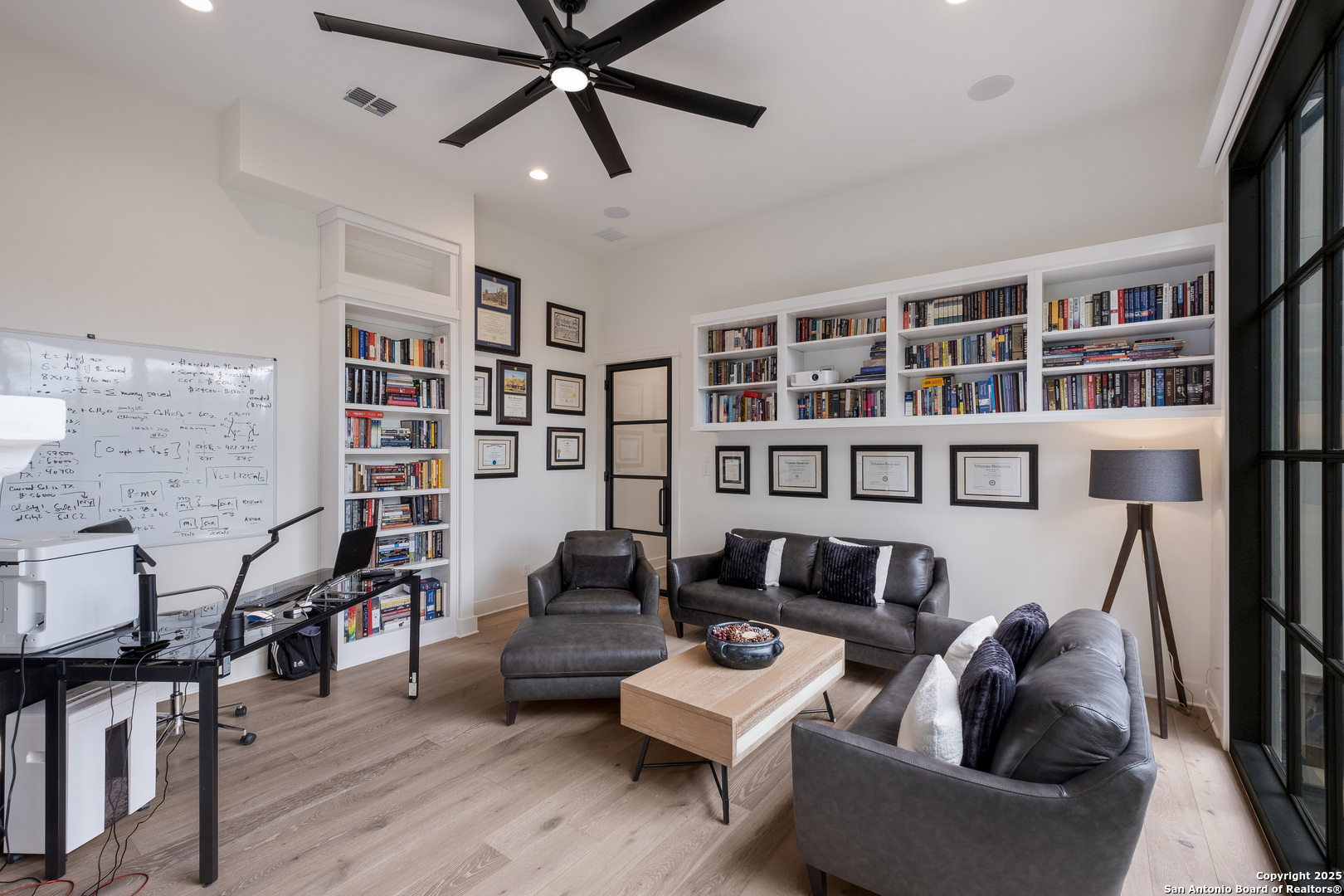 1341 Palmetto Spring Branch Spring Branch, TX 78070 - Photo 21 of 64 a living room with furniture and a book shelf