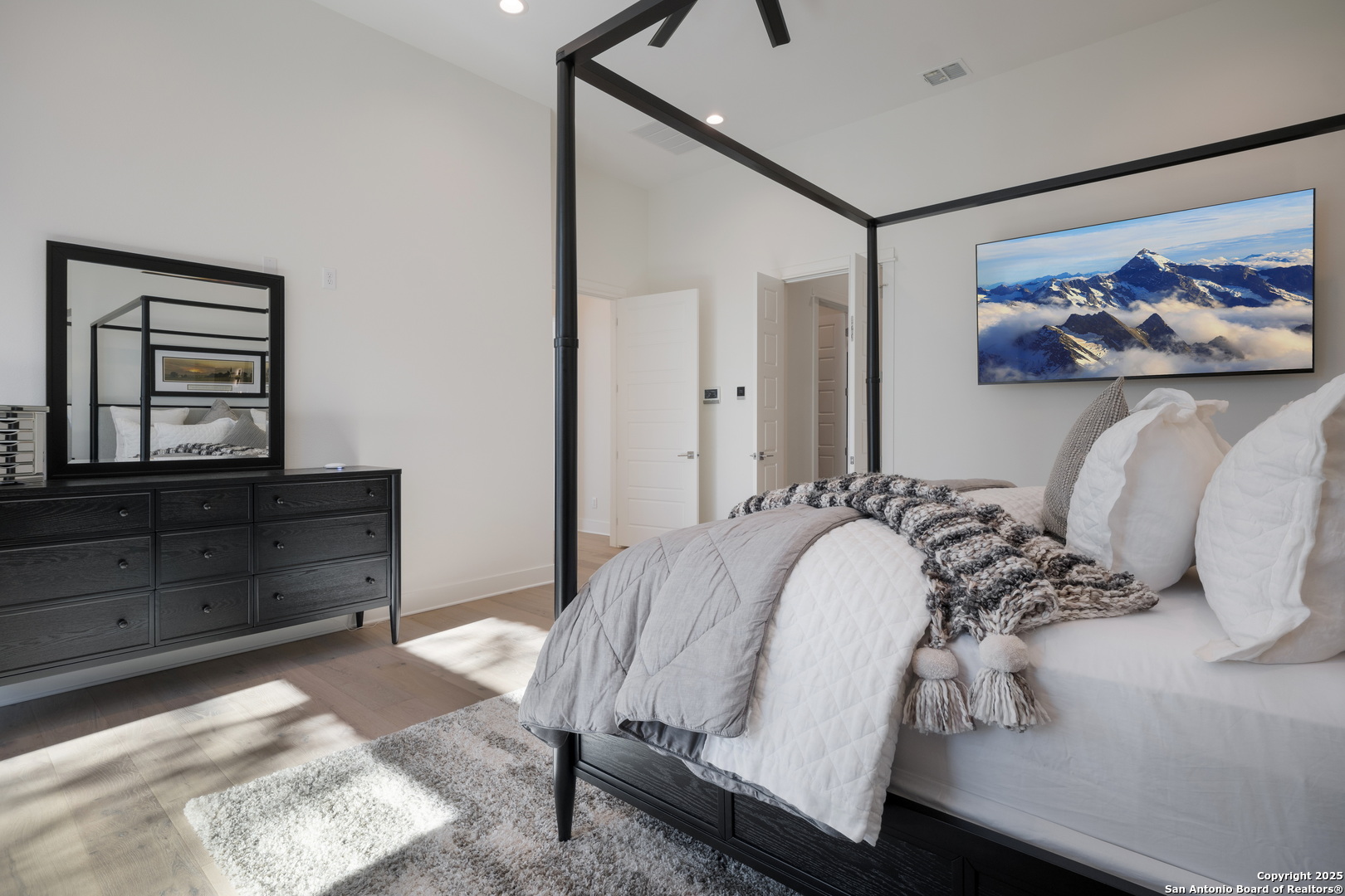 1341 Palmetto Spring Branch Spring Branch, TX 78070 - Photo 27 of 64 a bedroom with a bed and a dresser