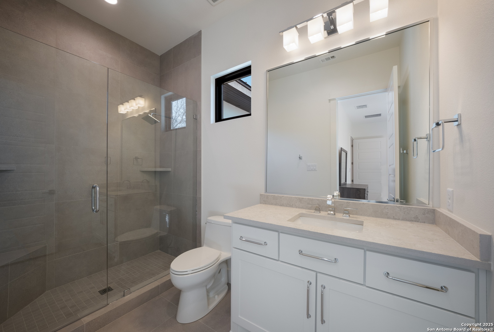 1341 Palmetto Spring Branch Spring Branch, TX 78070 - Photo 40 of 64 a bathroom with a sink a toilet and shower