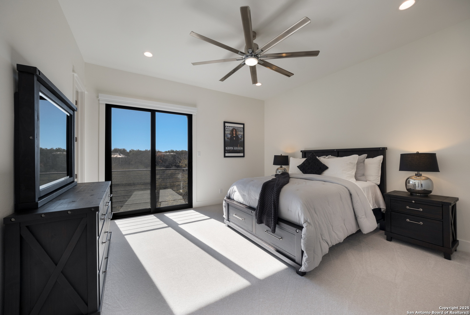 1341 Palmetto Spring Branch Spring Branch, TX 78070 - Photo 44 of 64 a bedroom with a bed and a chandelier