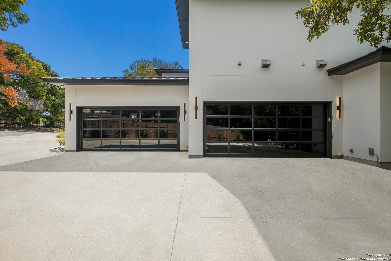 1341 Palmetto Spring Branch Spring Branch, TX 78070 - Photo 5 of 64 a view of a house with a large window and fire pit