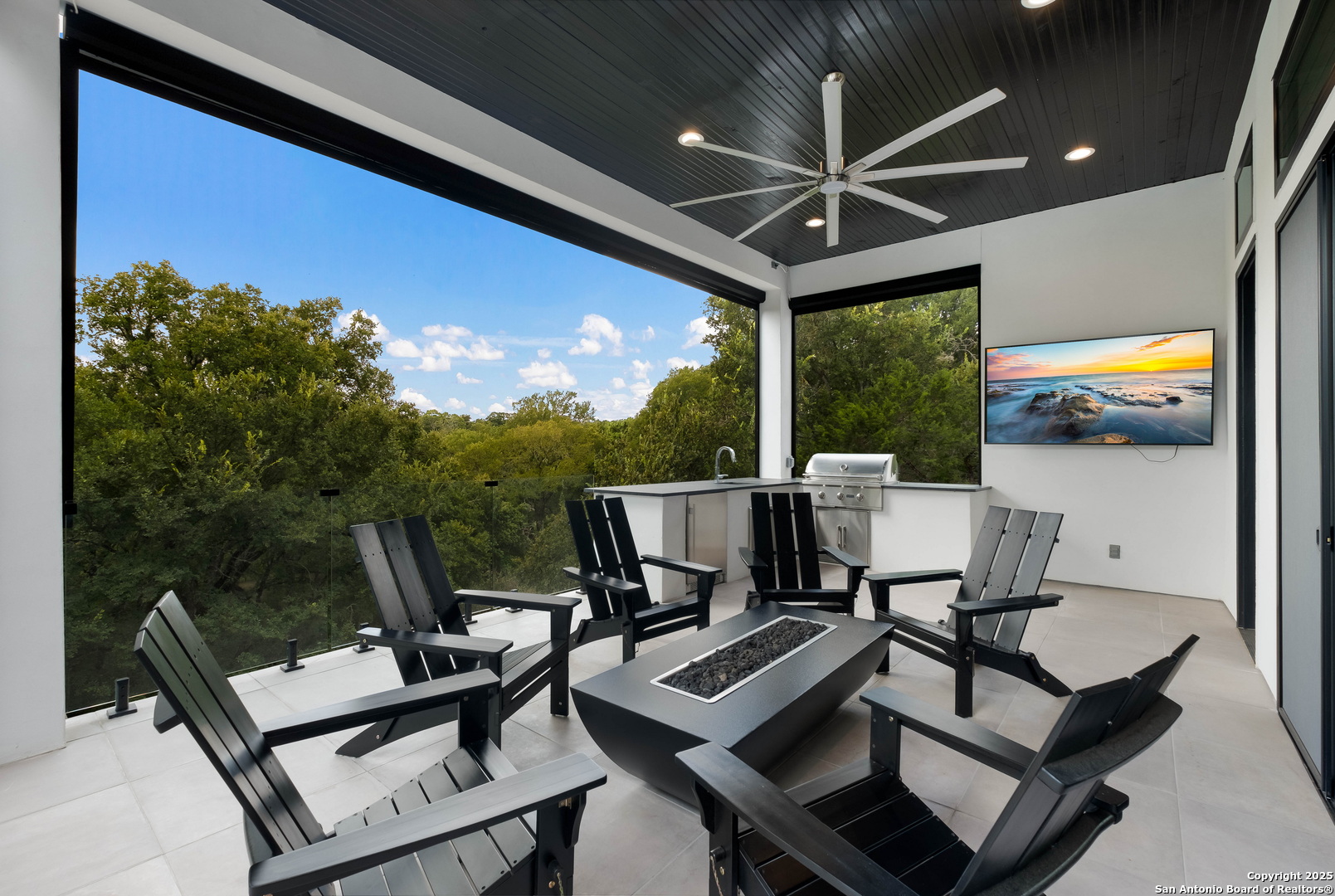 1341 Palmetto Spring Branch Spring Branch, TX 78070 - Photo 57 of 64 a view of a patio with a dining table and chairs
