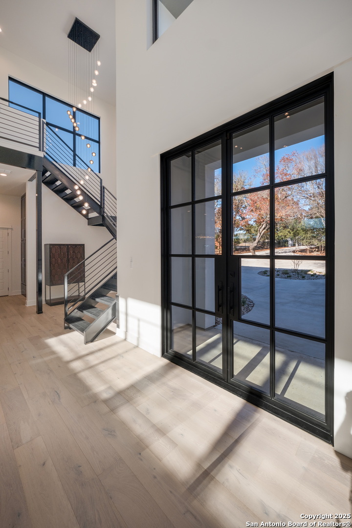 1341 Palmetto Spring Branch Spring Branch, TX 78070 - Photo 6 of 64 a view of a livingroom with furniture and staircase