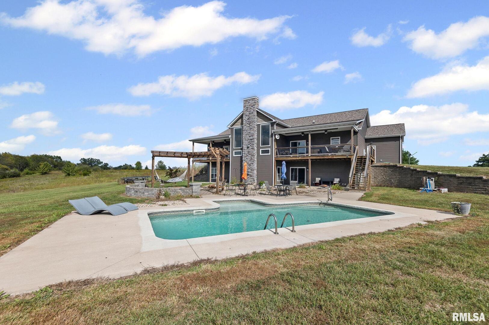 71 Ehlers Road Campbell Hill, IL 62916 - Photo 20 of 70 a view of a house with swimming pool and sitting area