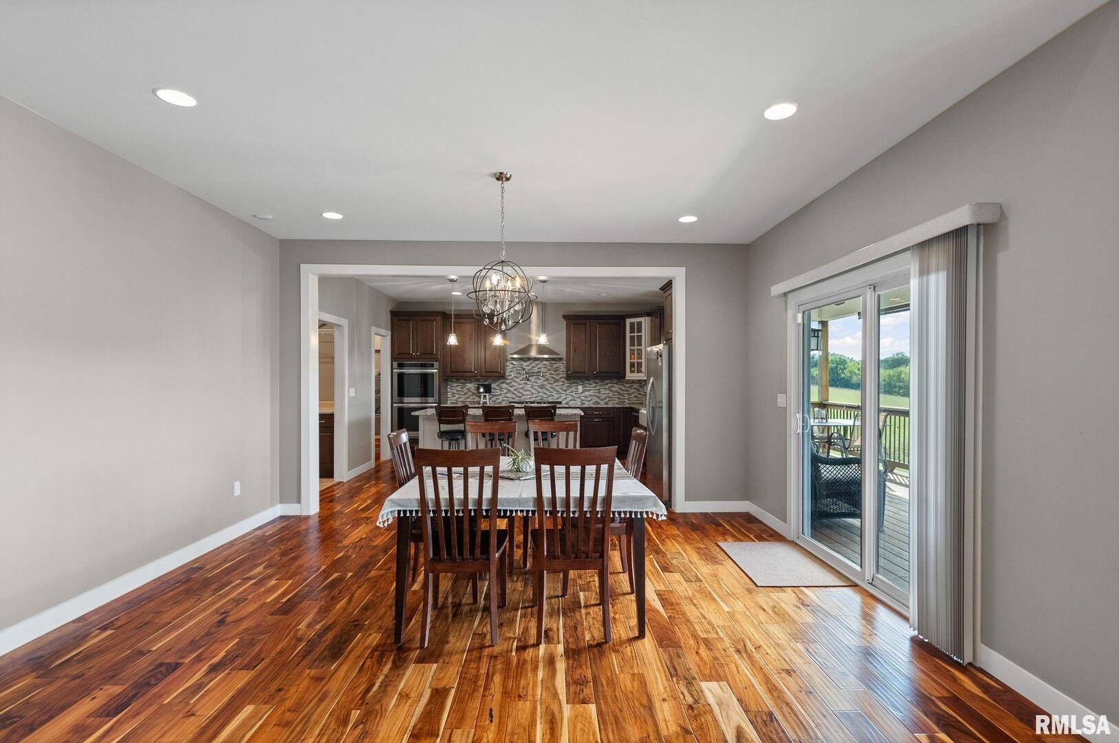 71 Ehlers Road Campbell Hill, IL 62916 - Photo 38 of 70 a view of a dining room with furniture window and wooden floor