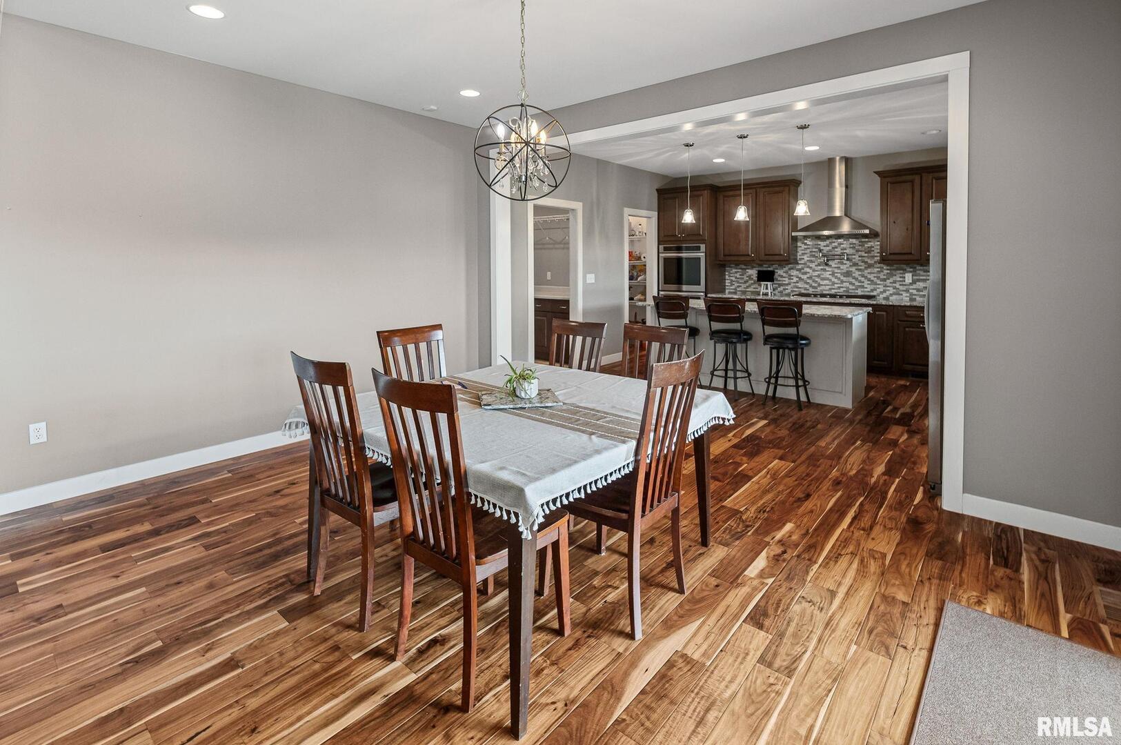 71 Ehlers Road Campbell Hill, IL 62916 - Photo 40 of 70 a view of a dining room with furniture and wooden floor