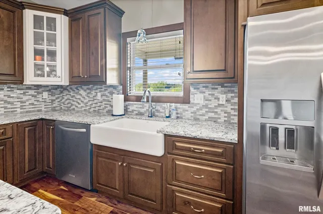 a bedroom with a bed and furniture