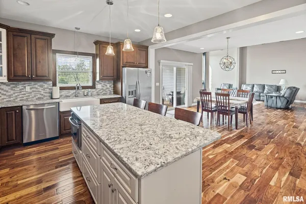 a dining room with furniture and a livingroom
