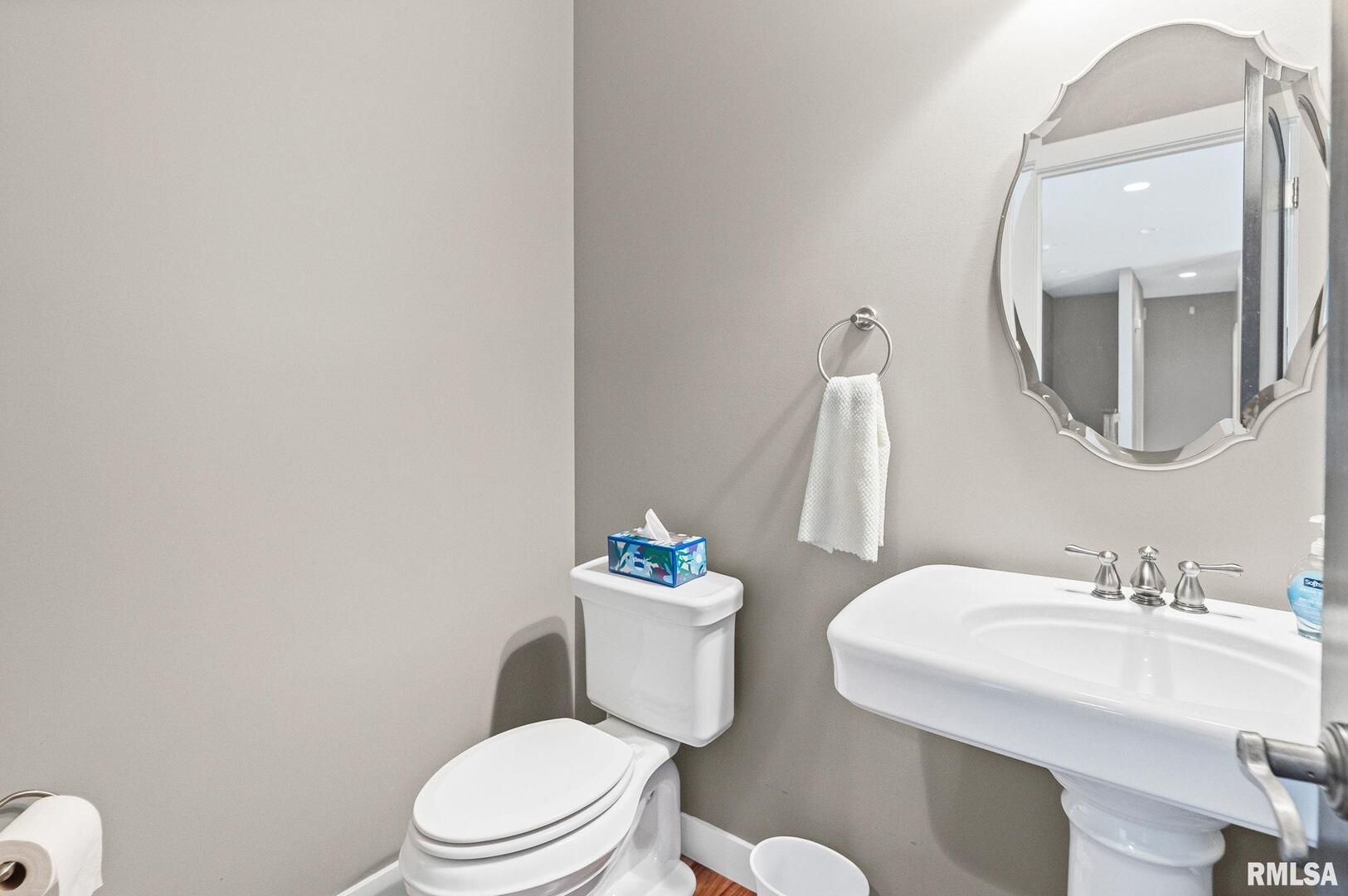 71 Ehlers Road Campbell Hill, IL 62916 - Photo 52 of 70 a white toilet sitting next to a bathroom sink