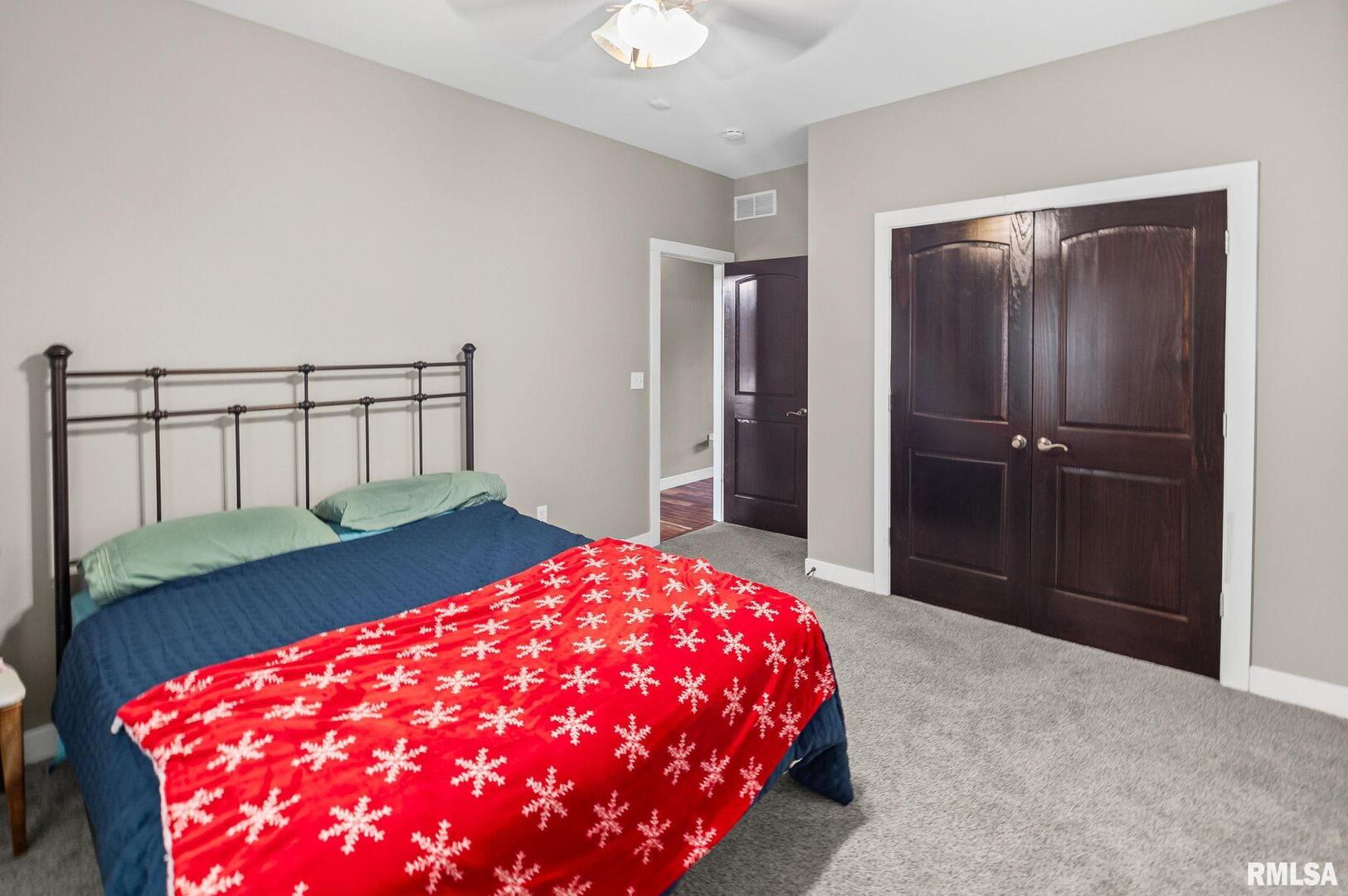 71 Ehlers Road Campbell Hill, IL 62916 - Photo 58 of 70 a bedroom with a bed and a chandelier