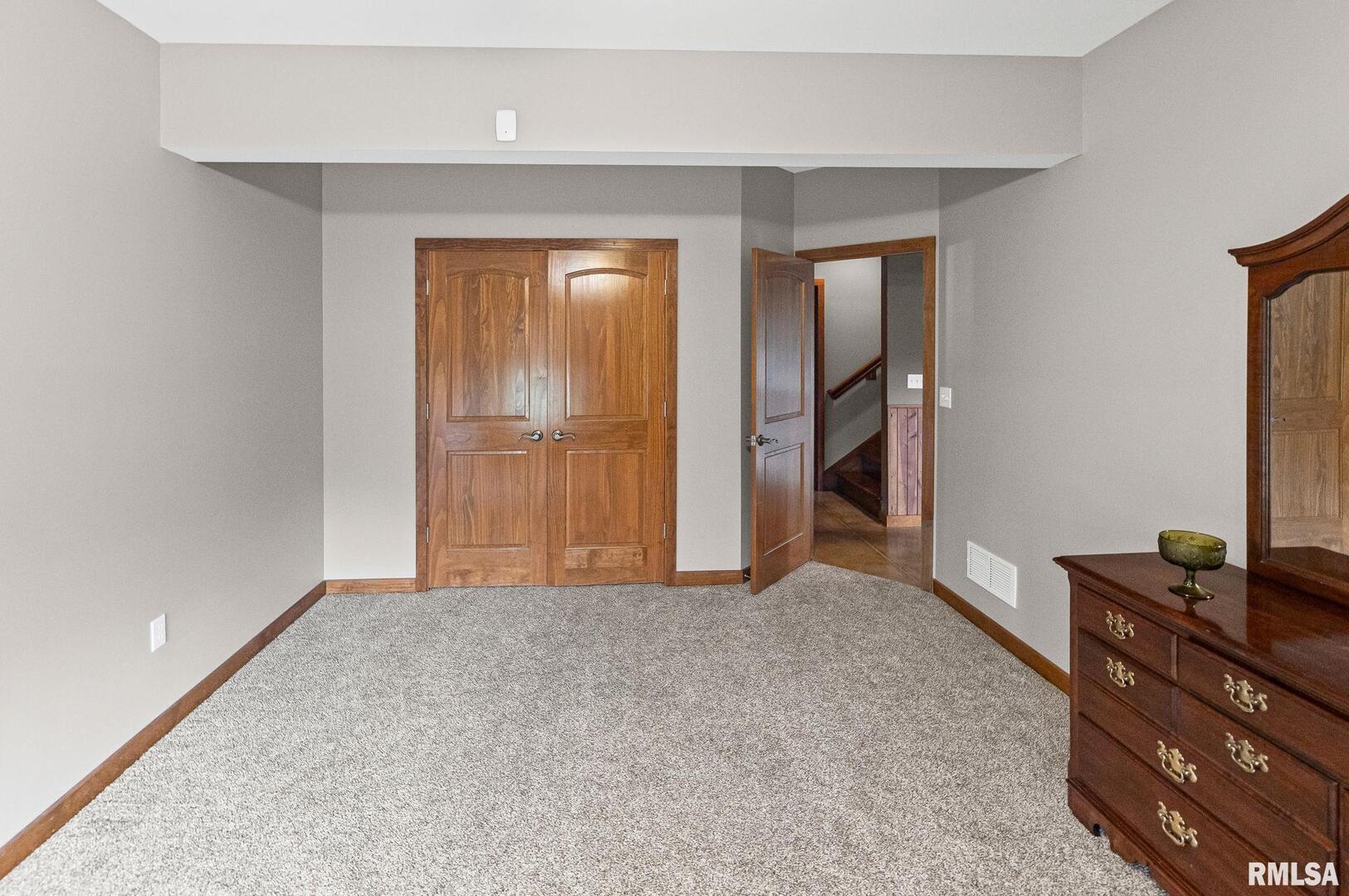 71 Ehlers Road Campbell Hill, IL 62916 - Photo 69 of 70 a view of an empty room with closet and wooden floor