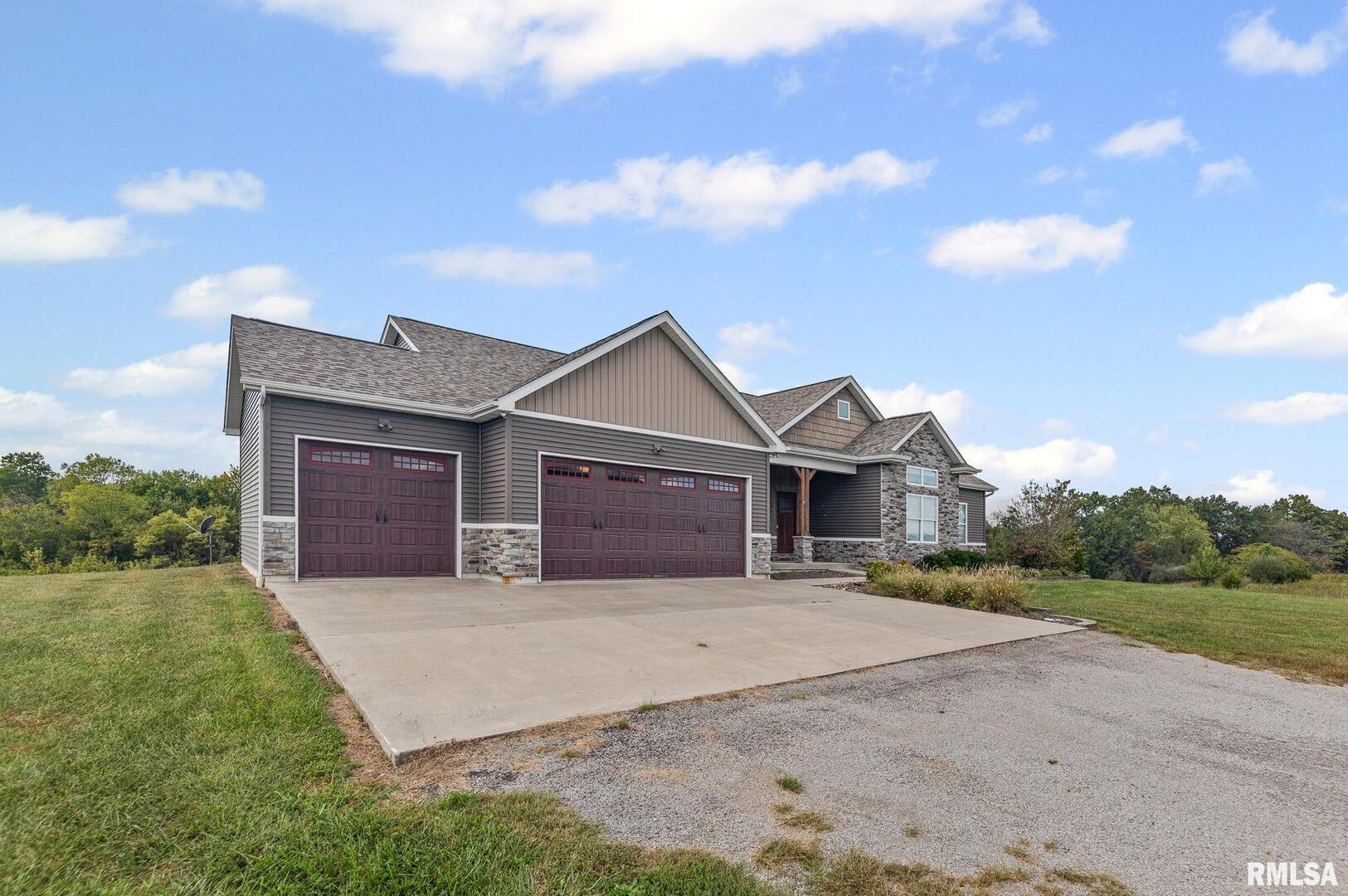 71 Ehlers Road Campbell Hill, IL 62916 - Photo 10 of 70 a front view of a house with a yard and garage
