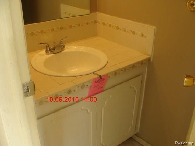 16405 Rudgate Street, Unit 6 Southgate, MI 48195 - Photo 6 of 12 half bath 9 10 16_timestamp.JPG