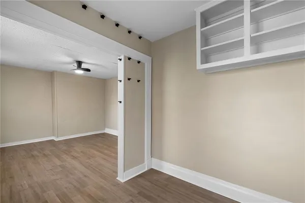 a bathroom with a sink a toilet and bathtub