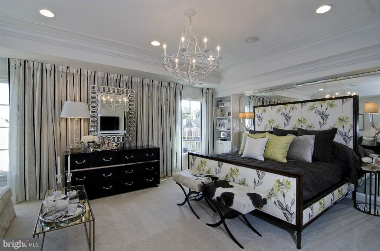 1407 Ridgeview Way Washington, DC 20007 - Photo 14 of 30 a spacious bedroom with a bed mirror and window