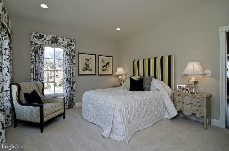 1407 Ridgeview Way Washington, DC 20007 - Photo 20 of 30 a bedroom with a bed chair and window
