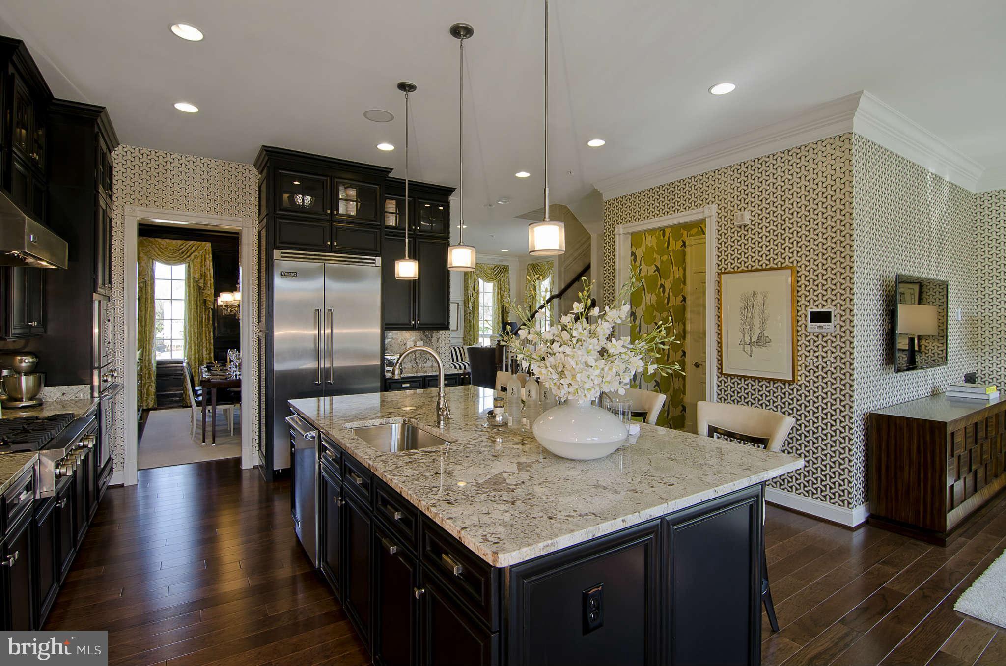 1407 Ridgeview Way Washington, DC 20007 - Photo 5 of 30 a kitchen with center island table and chairs