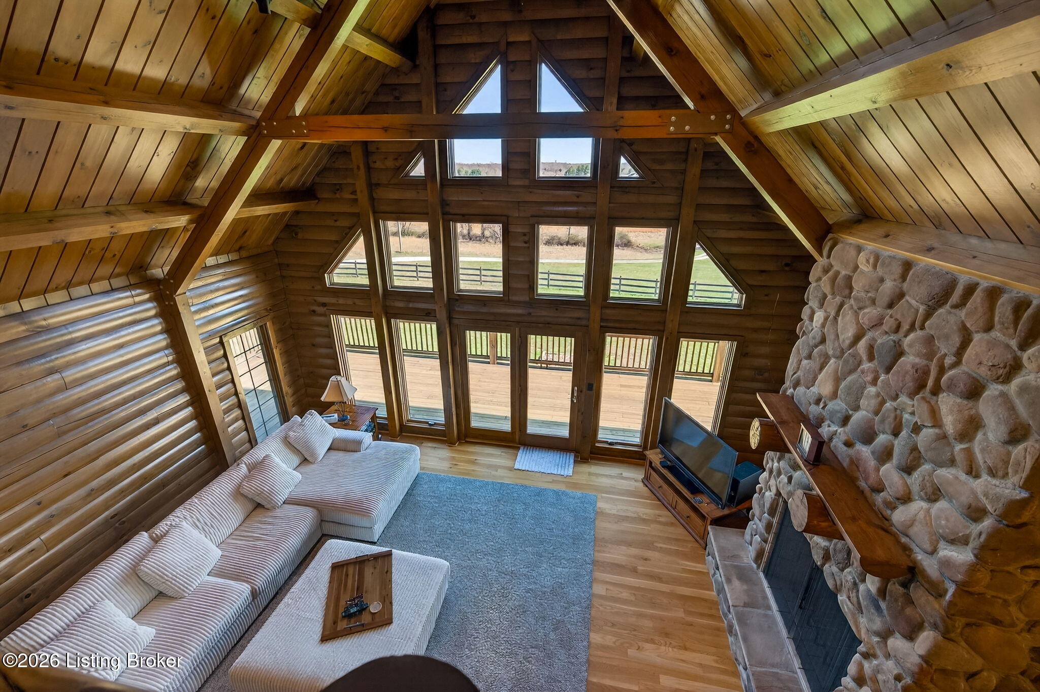 771 Mud Splash Road Elizabethtown, KY 42701 - Photo 50 of 85 The carpeted loft landing opens to the family room below, offering a bird's eye view of the fireplace, the wall of windows, and every inch of that remarkable vaulted ceiling