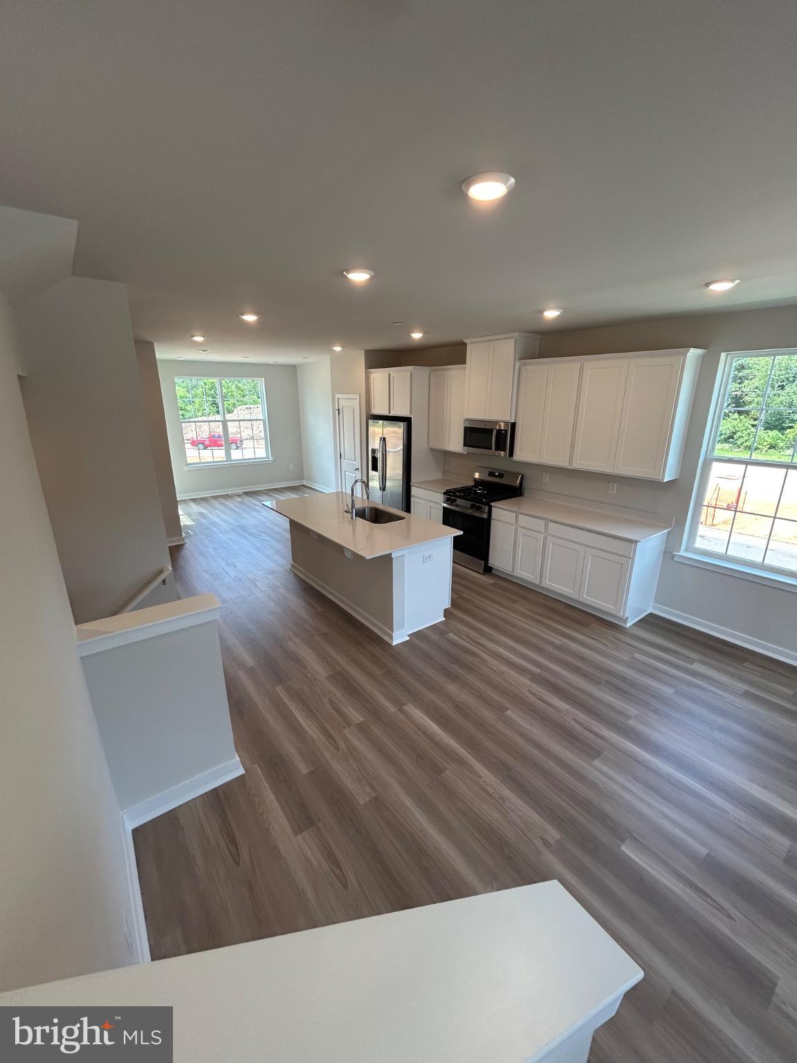 28 Barnes Way Sicklerville, NJ 08081 - Photo 21 of 40 a living room with furniture and a wooden floor