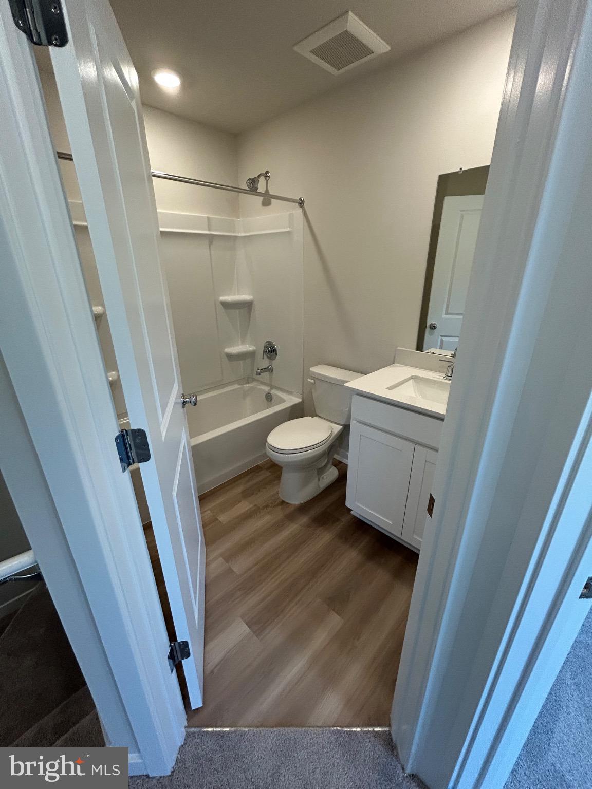 28 Barnes Way Sicklerville, NJ 08081 - Photo 25 of 40 a bathroom with a sink a toilet and shower