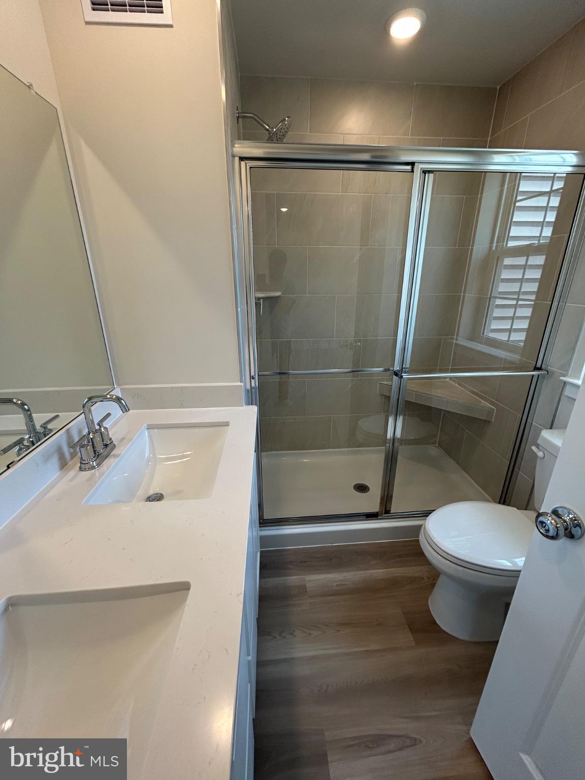 28 Barnes Way Sicklerville, NJ 08081 - Photo 28 of 40 a bathroom with a sink and a mirror