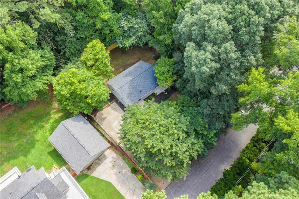 2951 Haralson Road Decatur, GA 30033 - Photo 2 of 25 an aerial view of a house with a yard and outdoor seating
