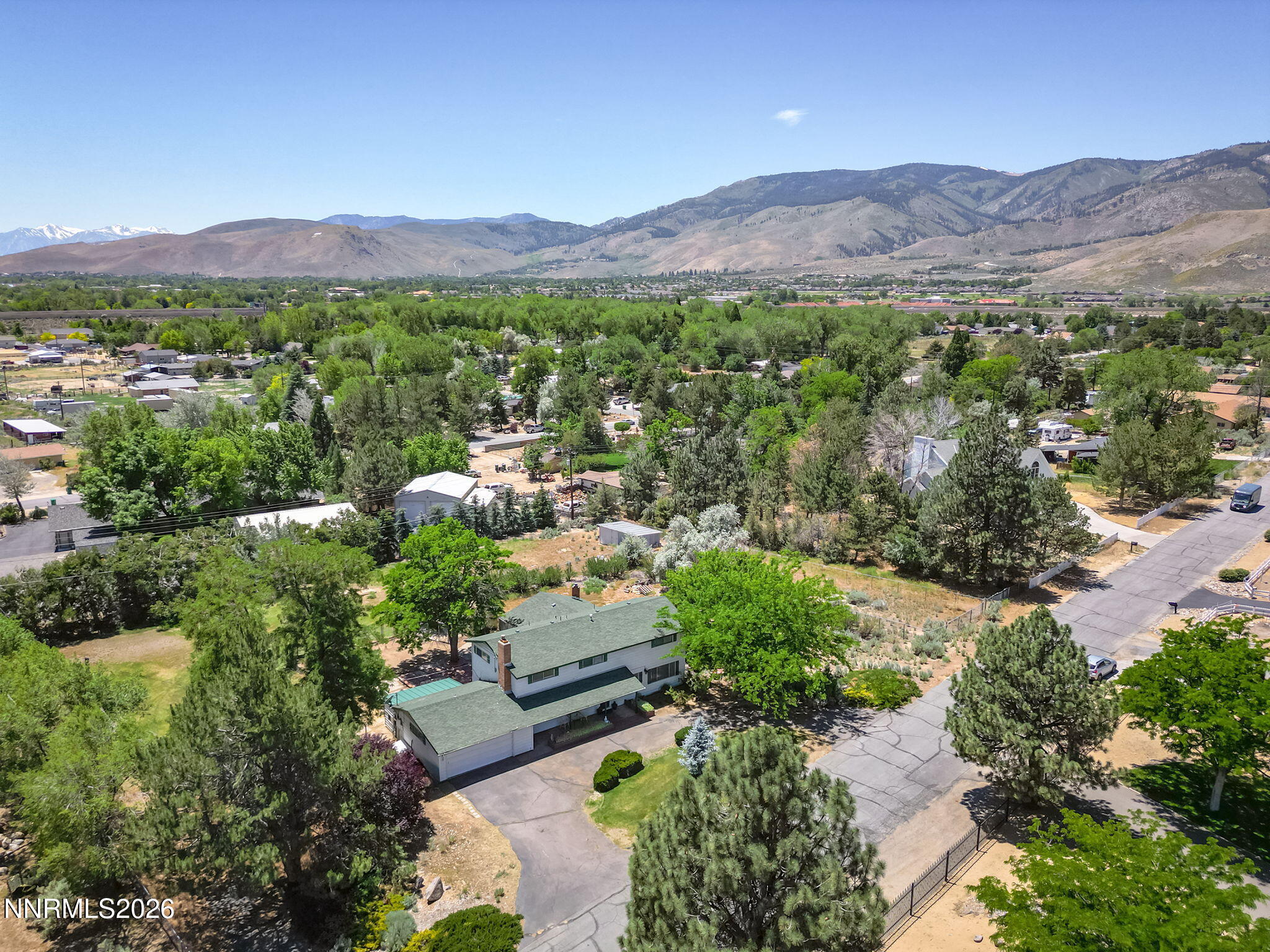 549 Ruby Lane Carson City, NV 89706 - Photo 5 of 37 a view of a lush green hillside and houses