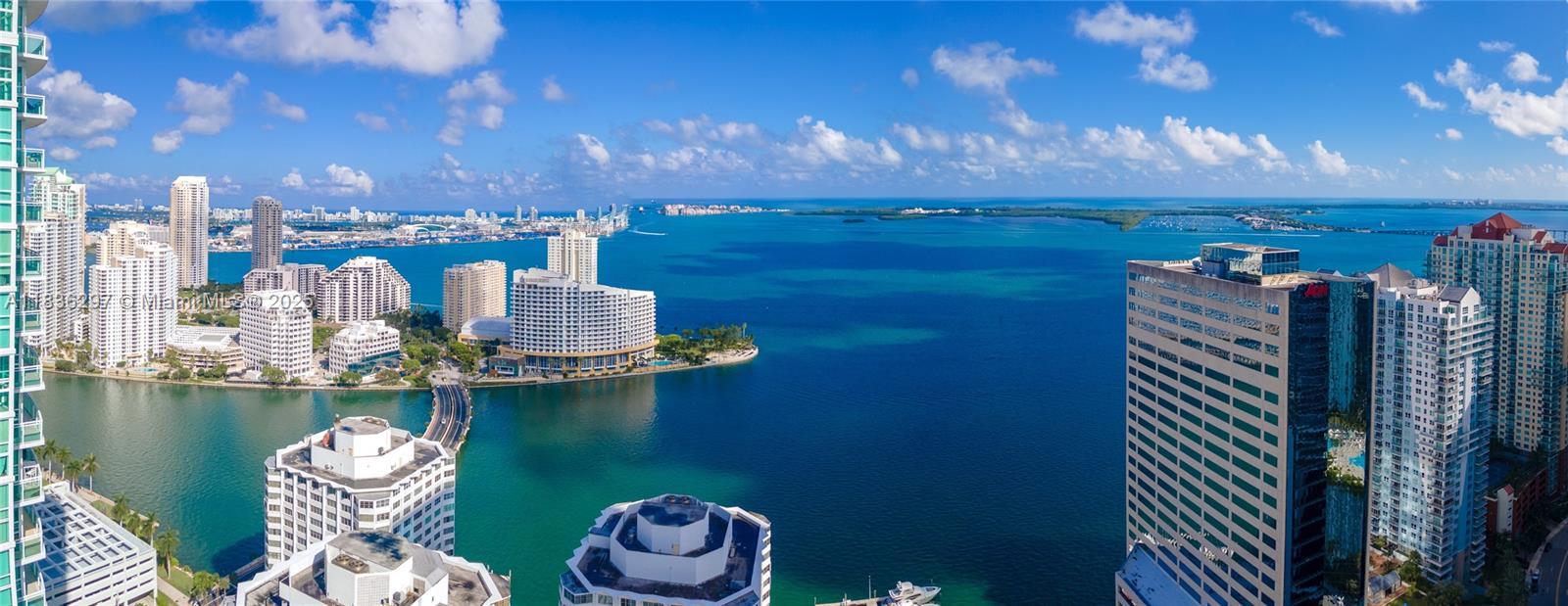 Brickell Miami, FL 33131 - Photo 16 of 17 a view of a balcony with dining table and chairs