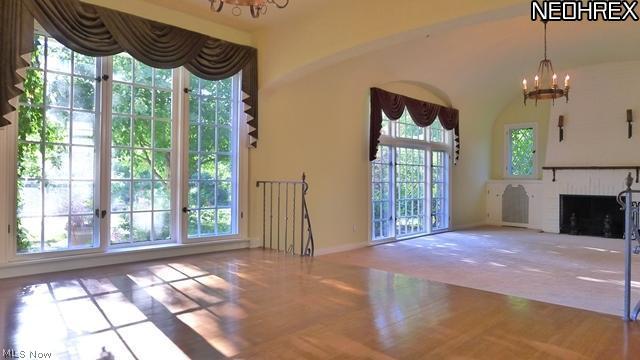 3261 Braemar Road Cleveland, OH 44120 - Photo 8 of 24 Beautiful iron work and all original restored sand blasted lighting in the Living Room and Dining Rooms