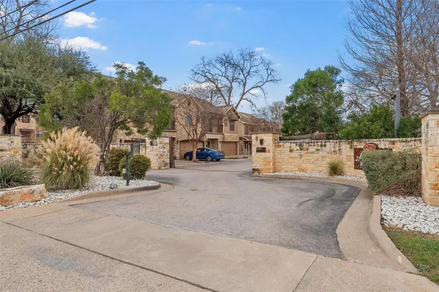 a view of street with parked cars