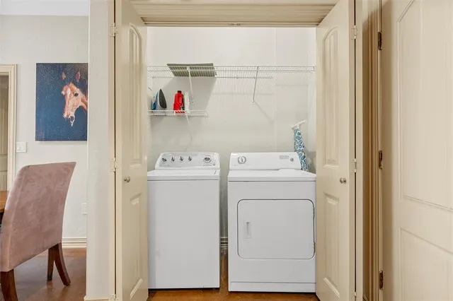 a utility room with dryer and washer