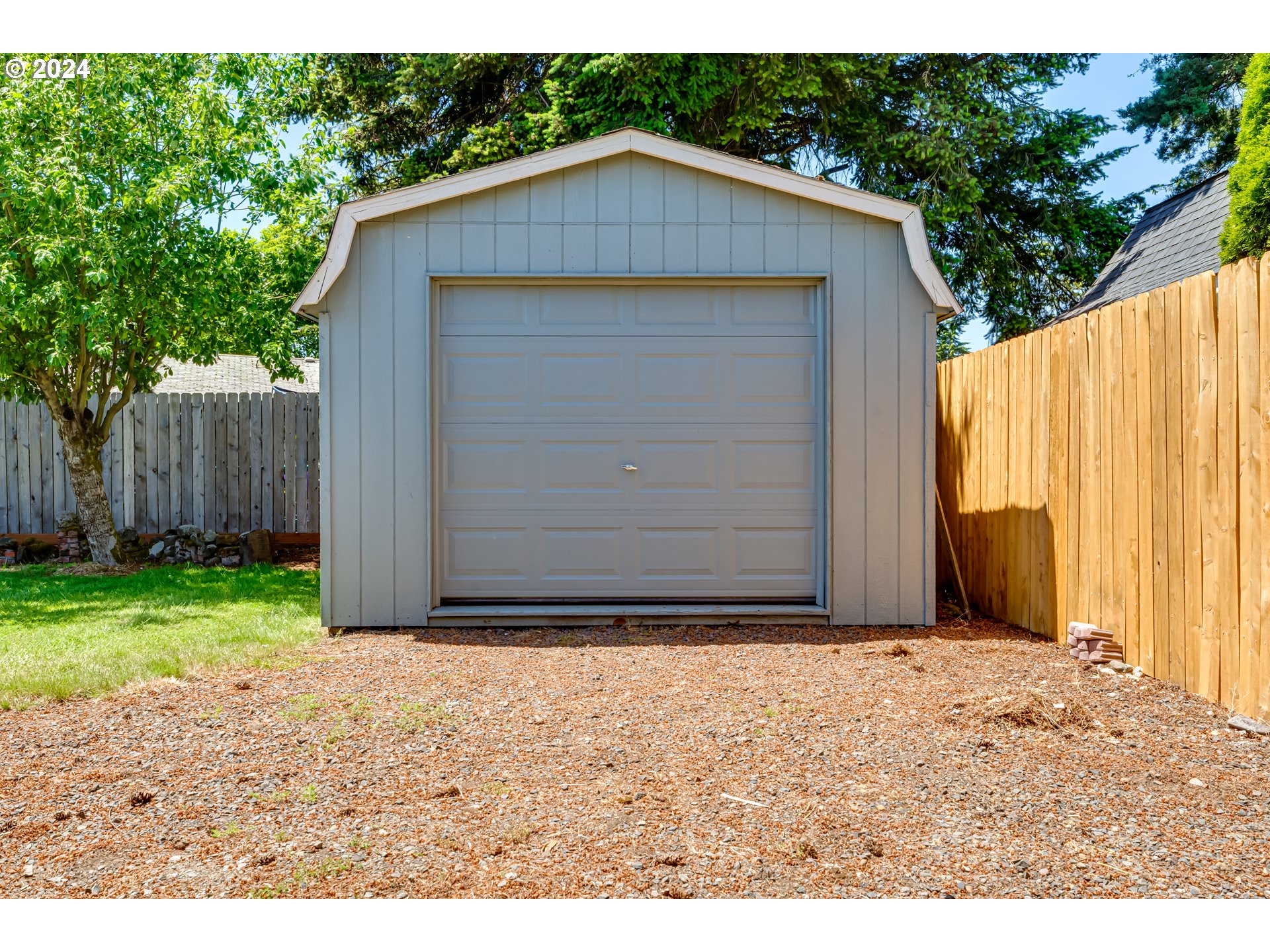 1048 Laurel Avenue Springfield, OR 97478 - Photo 36 of 37 a view of wooden house with a wooden fence