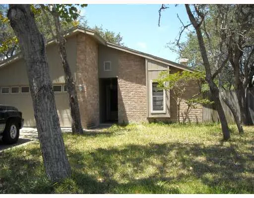 a view of a back yard of the house