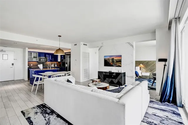 a living room with furniture or couch and a rug