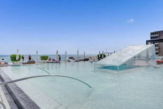 a view of a swimming pool and outdoor space