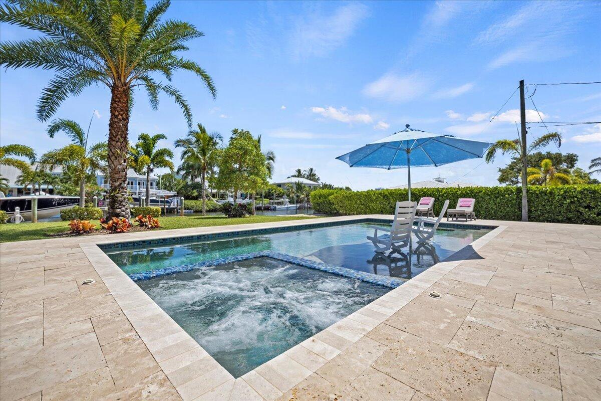 205 Body Court Jupiter, FL 33477 - Photo 59 of 75 Heated Salt Water Pool