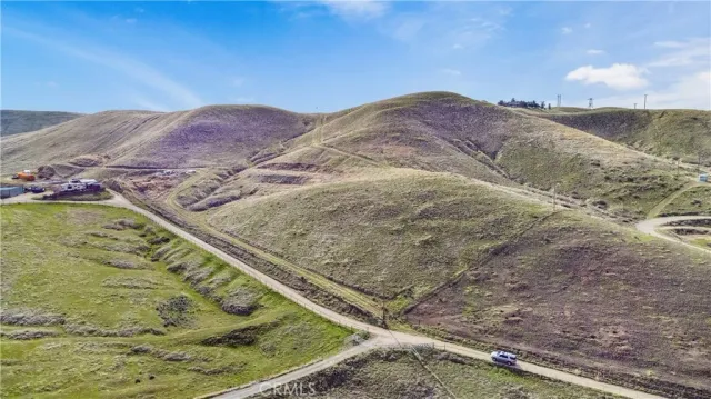 a view of a backyard of a house