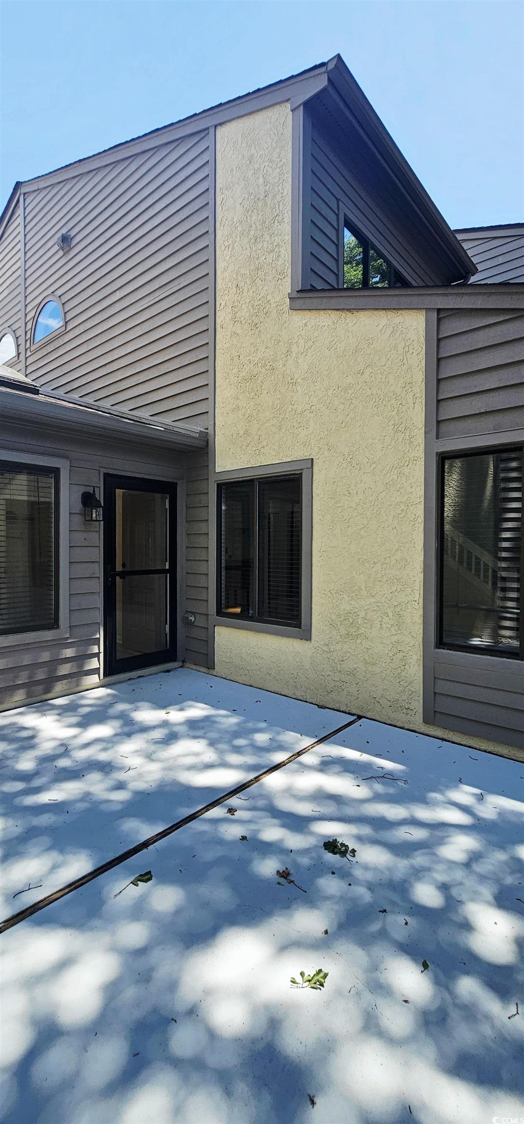 615 13th Avenue South, Unit 137 Surfside Beach, SC 29575 - Photo 36 of 40 View of home's exterior with stucco siding