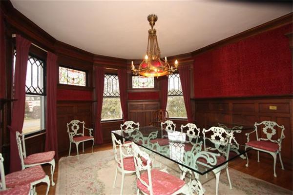 276 Longhill Street Springfield, MA 01108 - Photo 8 of 23 a view of a dining room with furniture and chandelier
