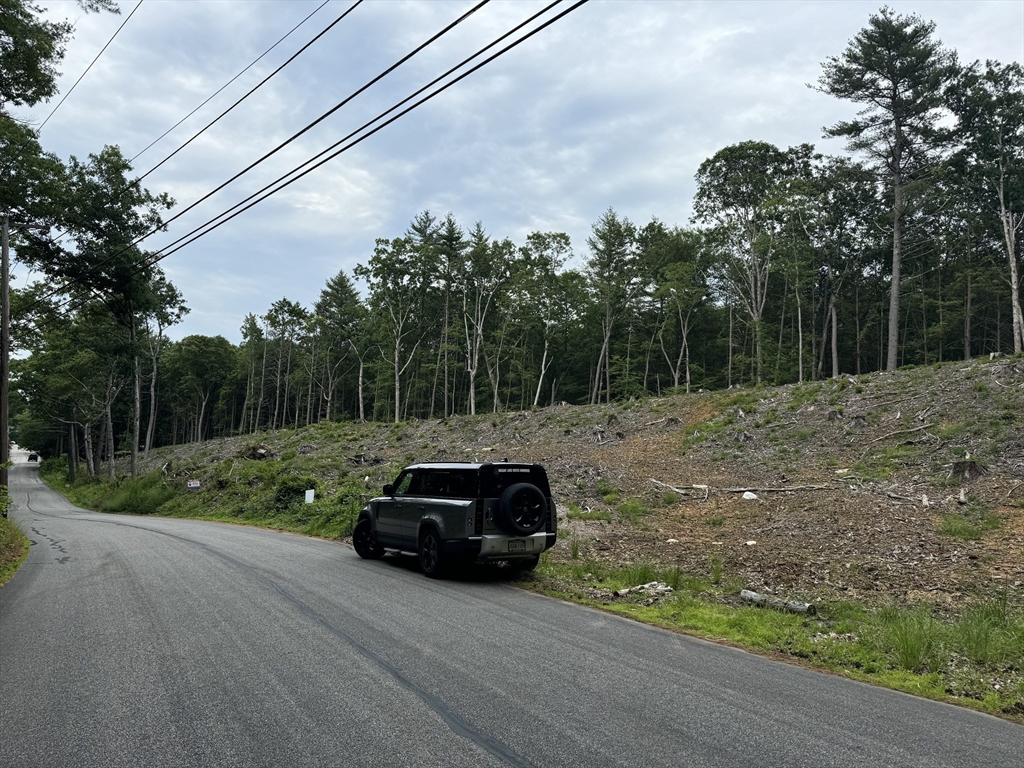 0 Alpine Drive Southbridge, MA 01550 - Photo 2 of 4 a car parked in front of a house and trees